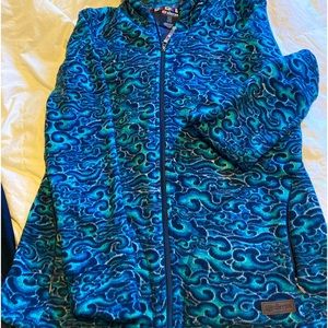 Sherpa brand, fleece jacket, paisley pattern.